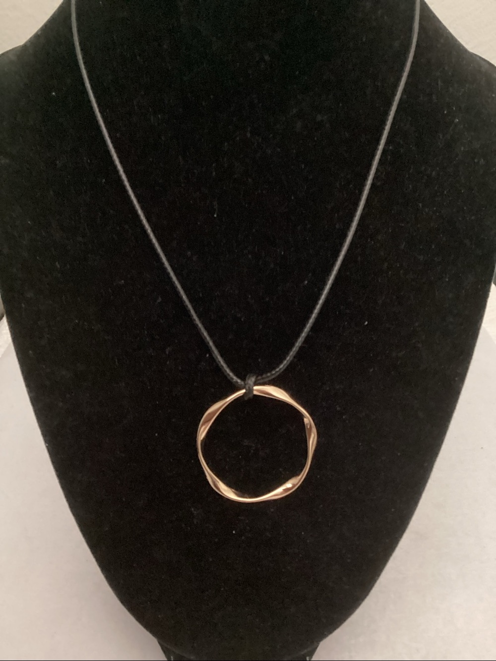 Gold Twist Circle Pendant Necklace on Black Cord